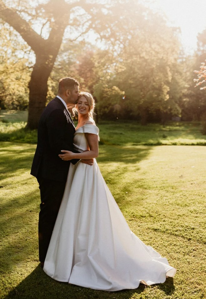 wedding couple in gardens of grittleton house