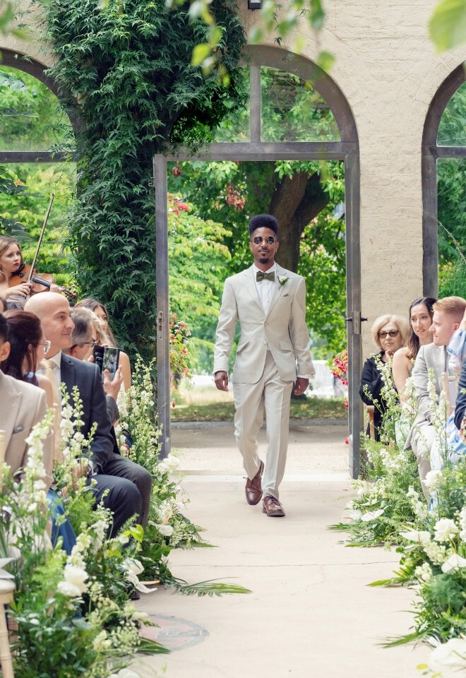 The Glasshouse Groomsman Arrival