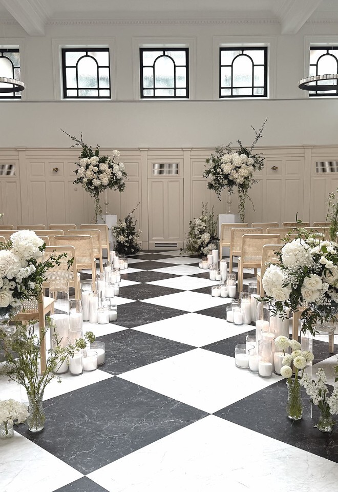 Ceremony setup with floral arrangements at The Collector’s Hall wedding venue in Glasgow