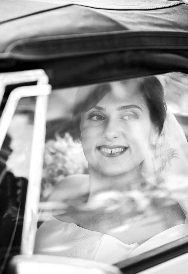 black and white bride in car