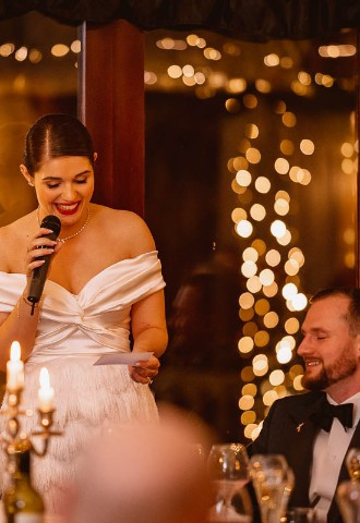 bride giving her wedding speech at the crazy bear, stadhampton, oxfordshire