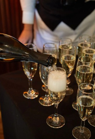 Champagne being poured for an event at The Grand