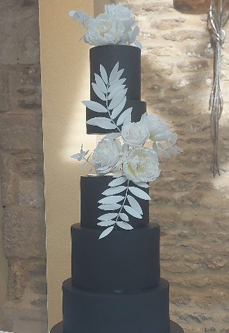 Black Wedding Cake with White Sugar Flowers