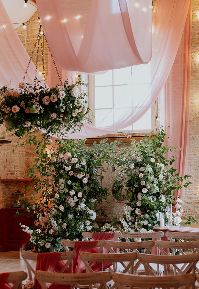 Ceiling draping and floral display at Merriscourt