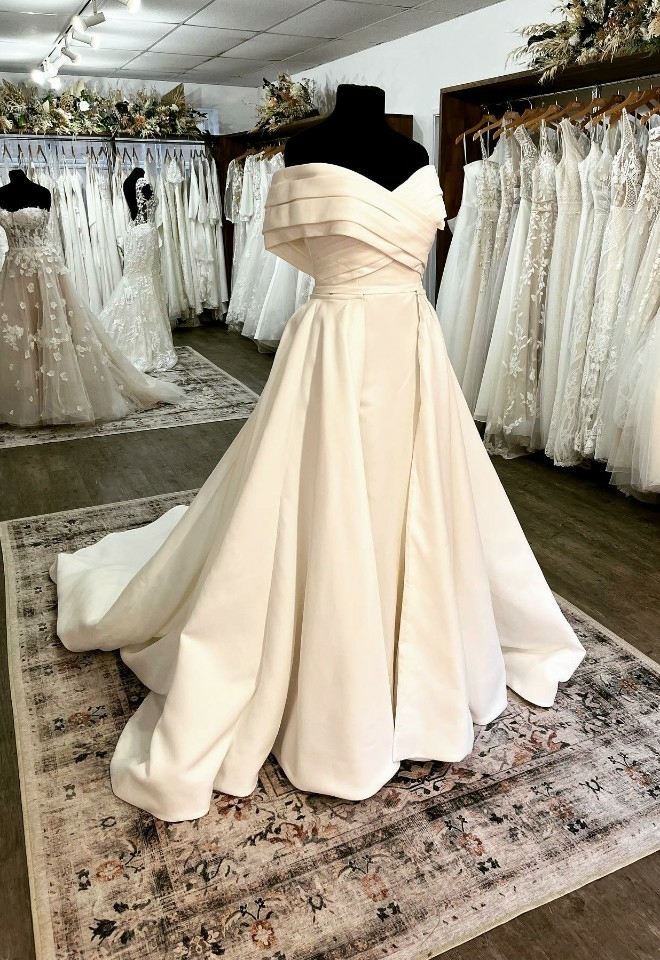 off the shoulder designer wedding dress from shades of white