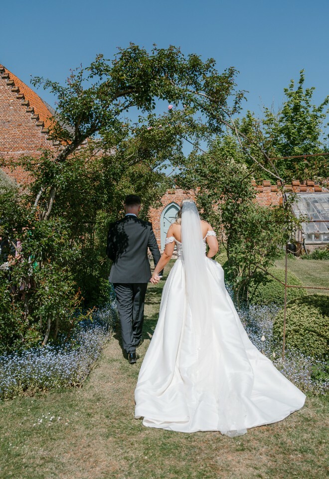Early May in the Rose Garden, Bride in Stunning Ballgown, Groom in Tux, Forget me nots, Blue Sky, 17th C in the background