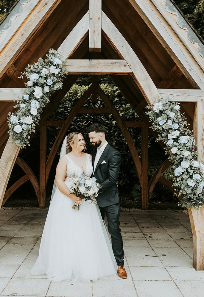 Couple in outdoor ceremony space