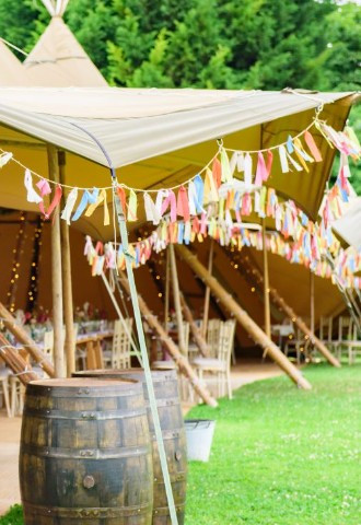 Wedding tipi marquee for festival wedding at Monkton Barn