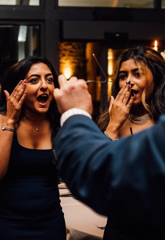 Wedding guests in awe of Richard Parsons, Gloucestershire Magician