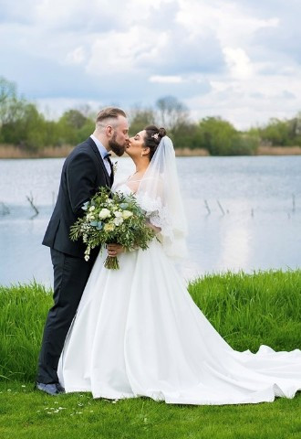 The lake makes a wonderful backdrop for your wedding photographs at De Vere Cotswold Water Park.