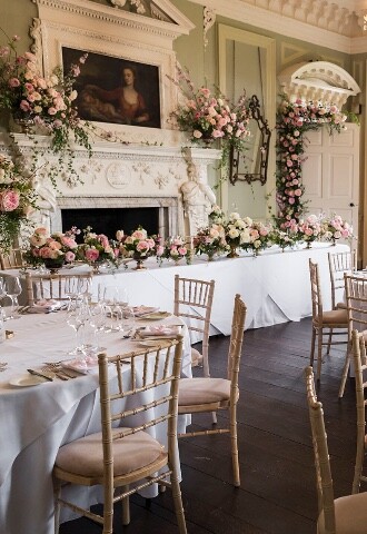 Top table and rounds set up in the dining room