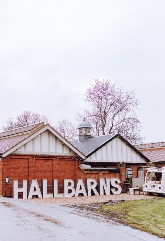barns wedding venue with large light up letter spelling hall barns