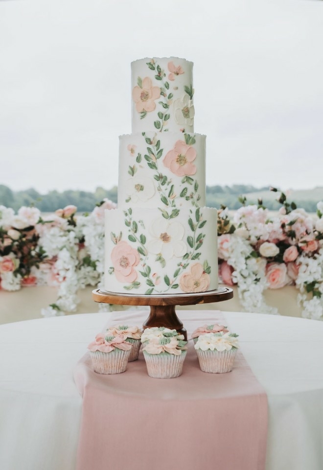wedding cake with wedding cupcakes with view over the chiltern hills at Chilterns View Wedding Venue