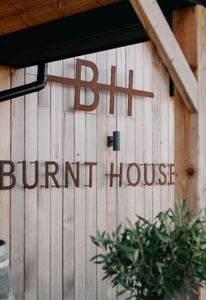 Burnt House Front of Venue