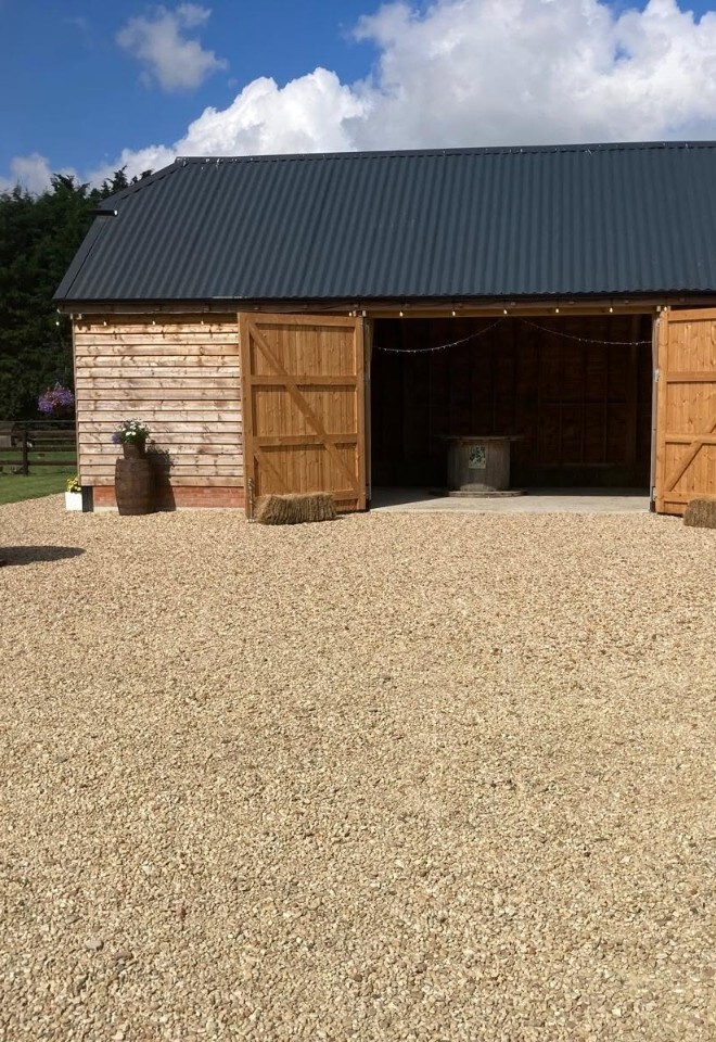 side wide double doors for the entrance to the Windsor Barn wedding reception venue near Wantage, Oxfordshire. Dry hire affordable weddings
