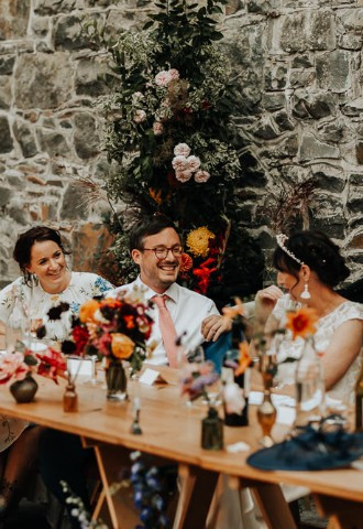 Wedding speeches being read at Plas Dinam, Mid Wales