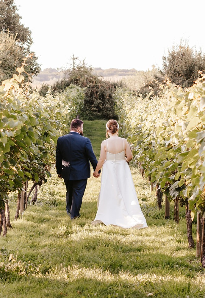 Hand in hand stroll through the vineyard