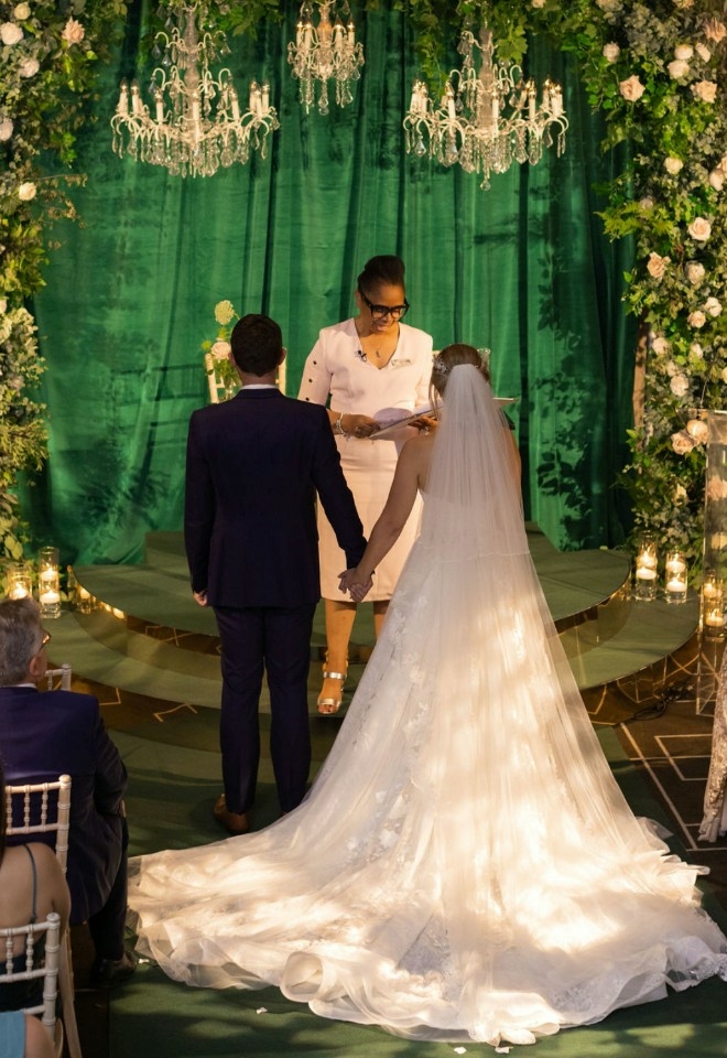 Jennifer Patrice, an experienced Independent Celebrant, with a happy couple on their wedding day, delivering an authentic, joyful, and personalised ceremony in a beautiful setting.