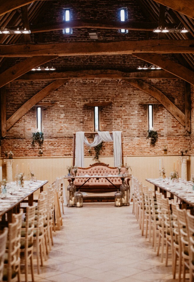 Kings Tables with Lavish Sofa for the wedding couple