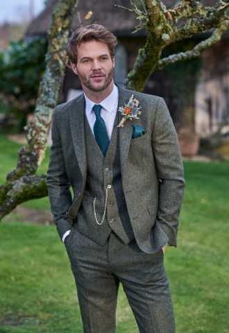 Groom and best mans outfits in green tweed for your wedding