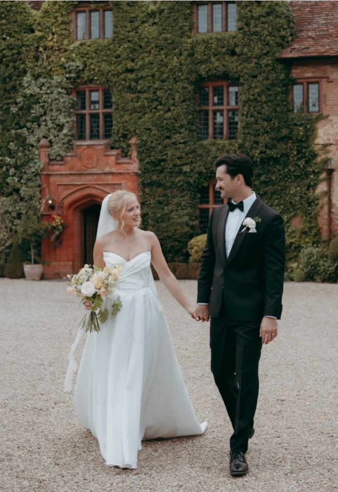 Wedding couple with natural flowers