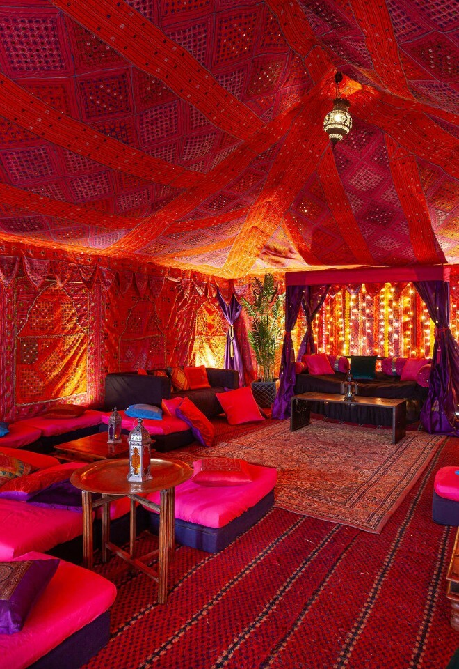 Marquee in a private garden set up with bombay boudoir linings for a mehndi party 