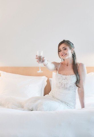 Bride enjoying Champagne 