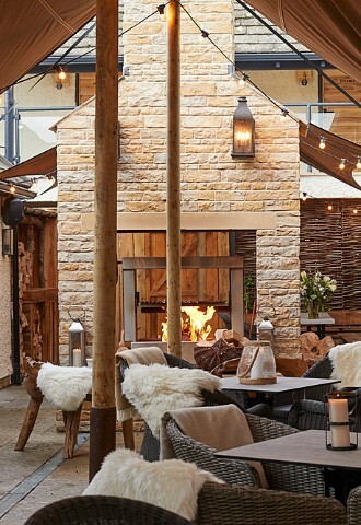 Cosy outdoor drinks reception setting at Wild Thyme and Honey wedding venue Gloucestershire
