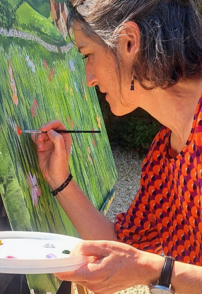 guest painting at wedding