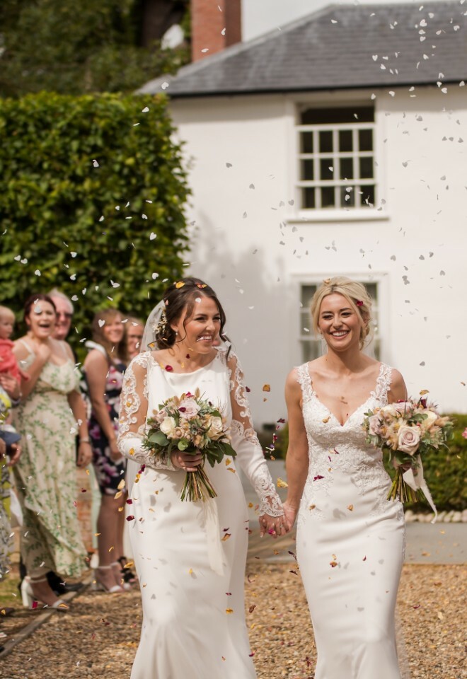 Here come the Brides, confetti shot at Vaulty Manor