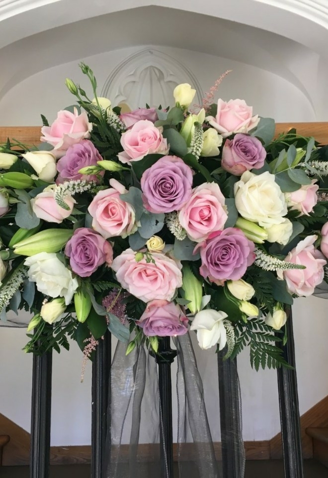Pink and purple flower banister display by hire heaven