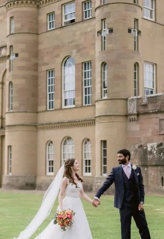 bride and groom exploring the grounds at culzean castle wedding venue in ayrshire scotland
