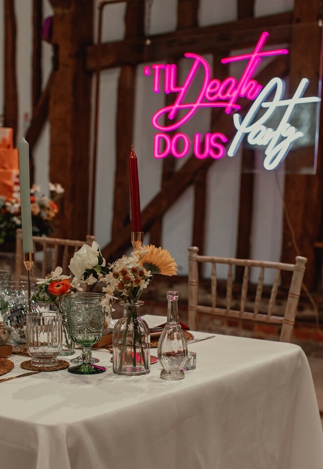 Til death do us party neon sign and table styling