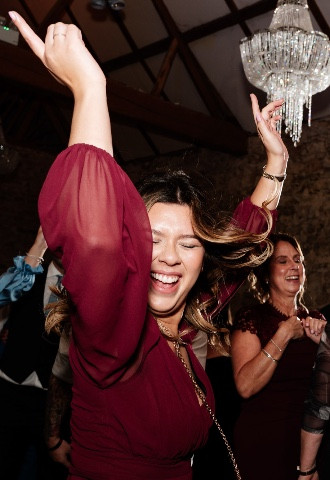 Bridesmaid dancing at Notley Abbey 