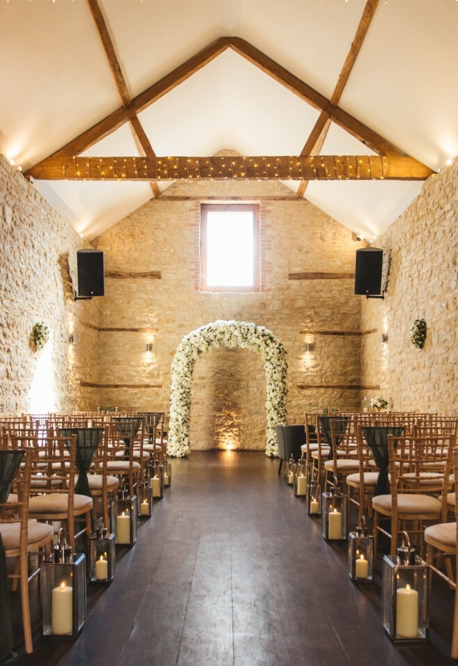 Ceremony Barn with flower arch