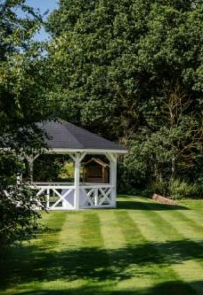 Side view of a pagoda ceremony with striped grass- Sprowston Manor Norwich