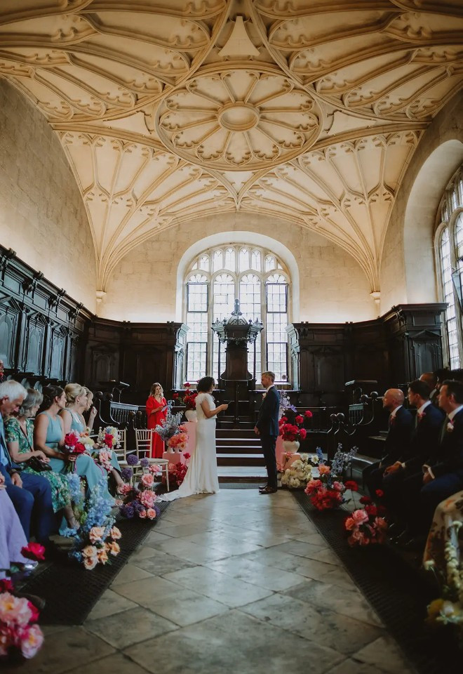 Wedding vows taking place in the Convocation House