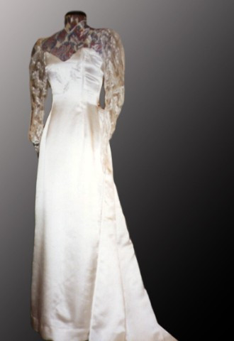 Silk satin wedding dress with long lace sleeves and detachable train