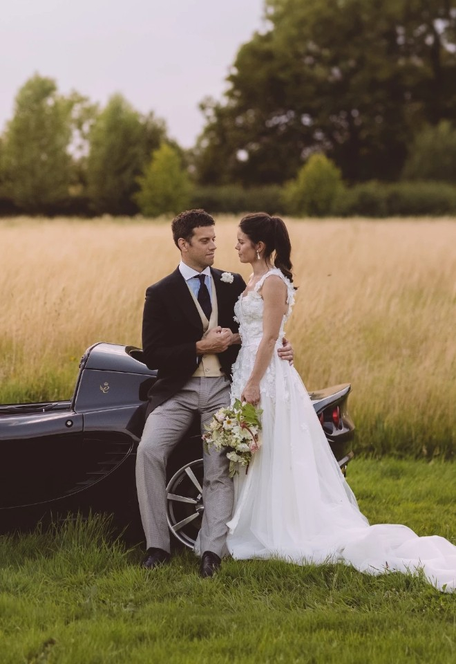 Bride and Groom on car at Retreat East Wedding Venue
