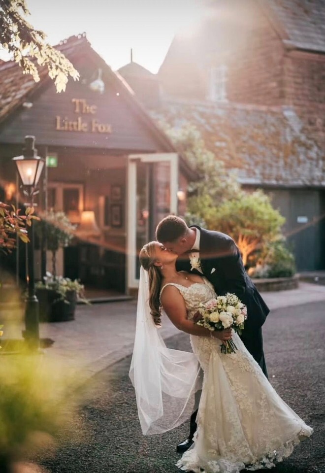 Bride and groom in front of the Little Fox Wedding Venue in Merseyside