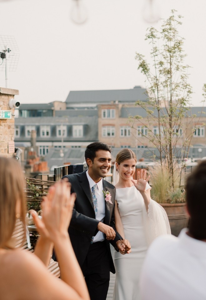 Wedding Couple and guests on the wedding terrace at  The Conduit in Convent Garden