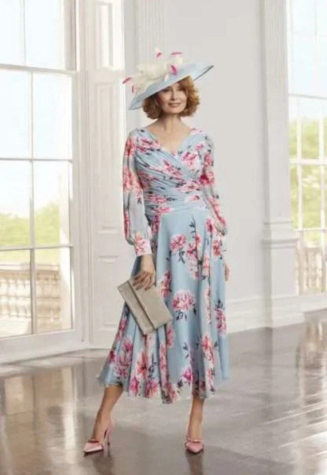 ondici in Ashley print. A long sleeve flowy chiffon dress with an aline skirt and floral print. Available at Chameleon Bride Bournemouth Dorset