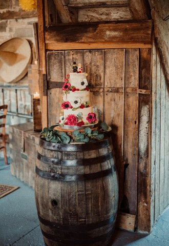 Three tiered wedding cake at Midelney Manor wedding venue