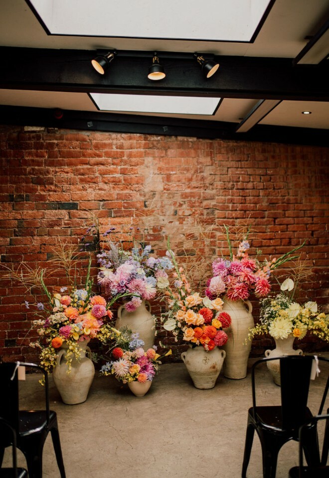 Colourful floral display at top of aisle 