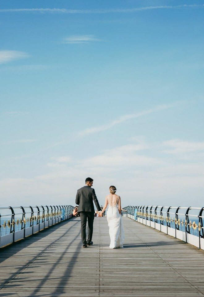 Couple on the pier at the beach
