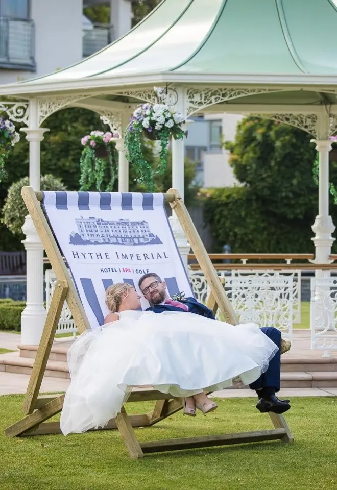 Seaside Hotel Wedding venue, The Hythe Imperial, Ciouple on Deck Chair