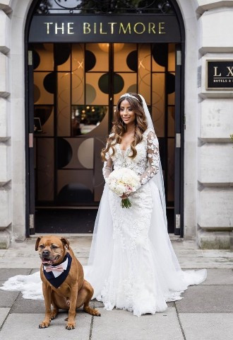 Bride and dog outside the Biltmore Mayfair