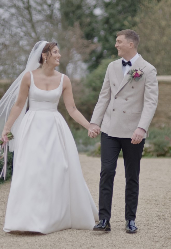 Bride and groom portrait in the gardens of Caswell House, Oxfordshire, captured by Dean Sherwood Wedding Films, Hertfordshire wedding videographer.