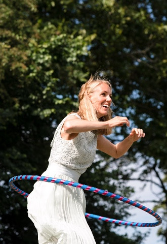 Wedding guest hula hooping 