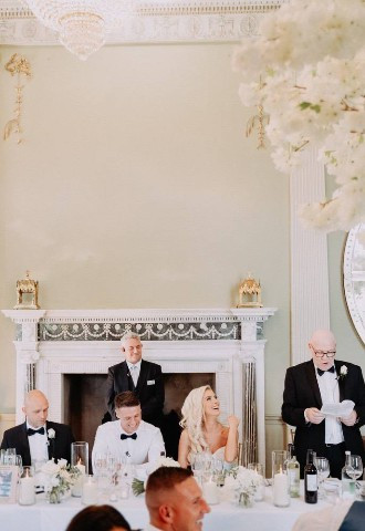 Wedding speeches being read at Howsham Hall, North Yorkshire